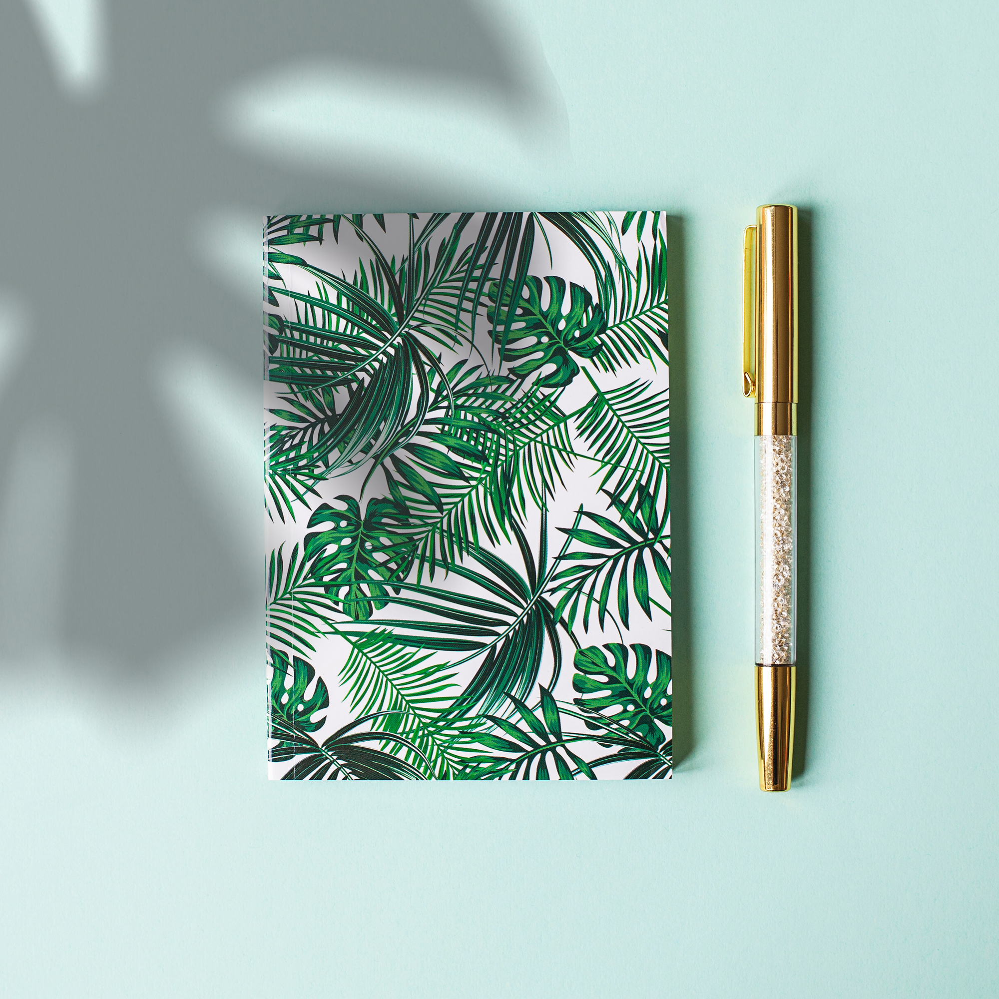 A journal with a plant pattern